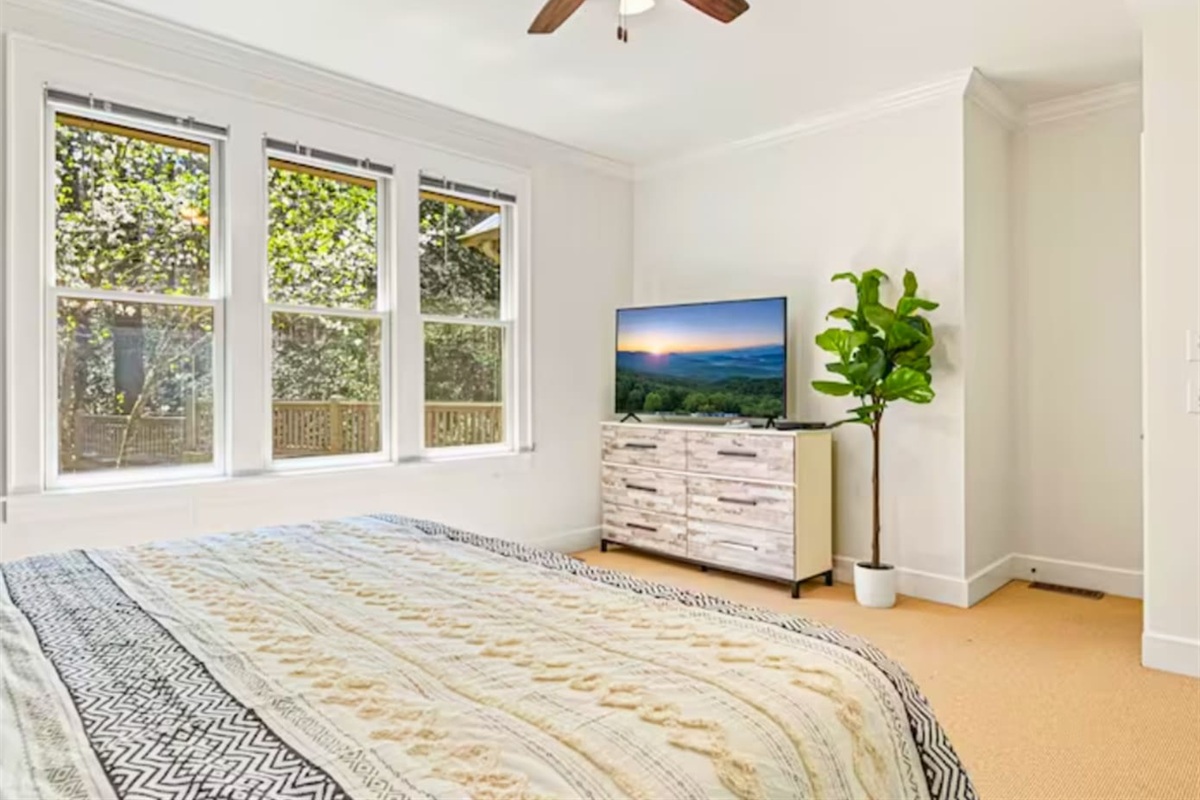 King Size Bed and Smart TV in the Primary Bedroom