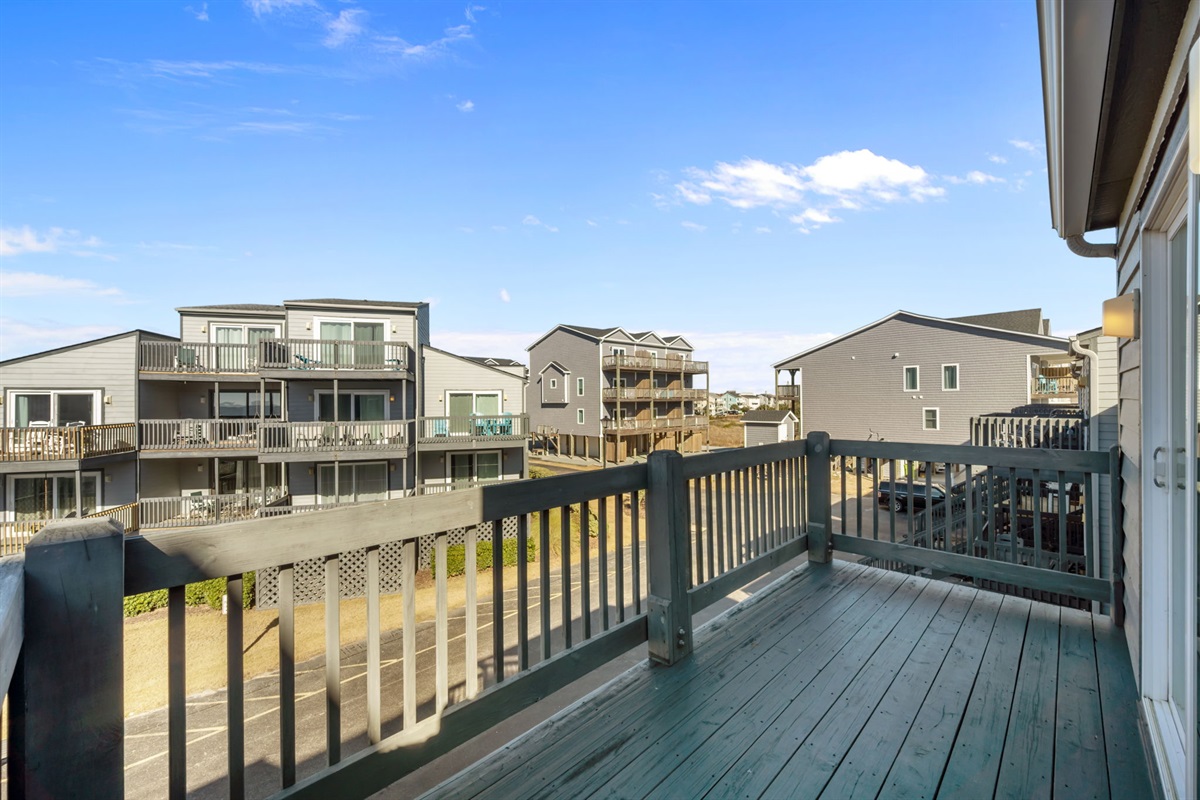 Overlooking the surrounding beach community&mdash;an easygoing outdoor spot for fresh air and quiet moments between outings
