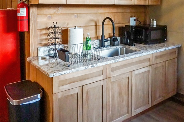 Kitchenette: Cook up memories in this modern kitchen with stylish fixtures and ample storage!