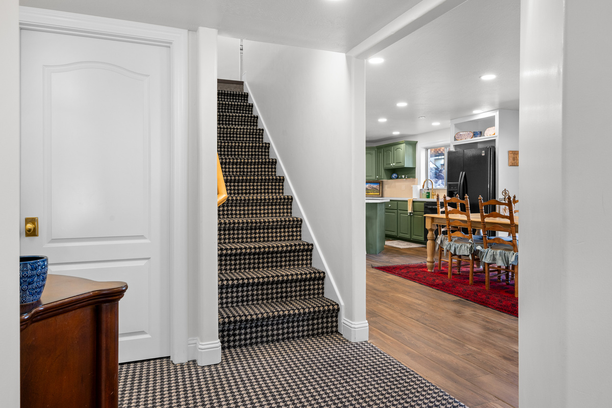 This bright passage connects the stairway, dining area, and lower-level Bedrooms, creating an easy and welcoming layout for larger groups.