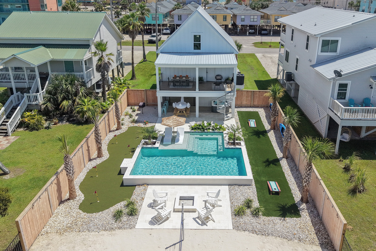 A bird’s-eye look at the private pool and activity-packed backyard.