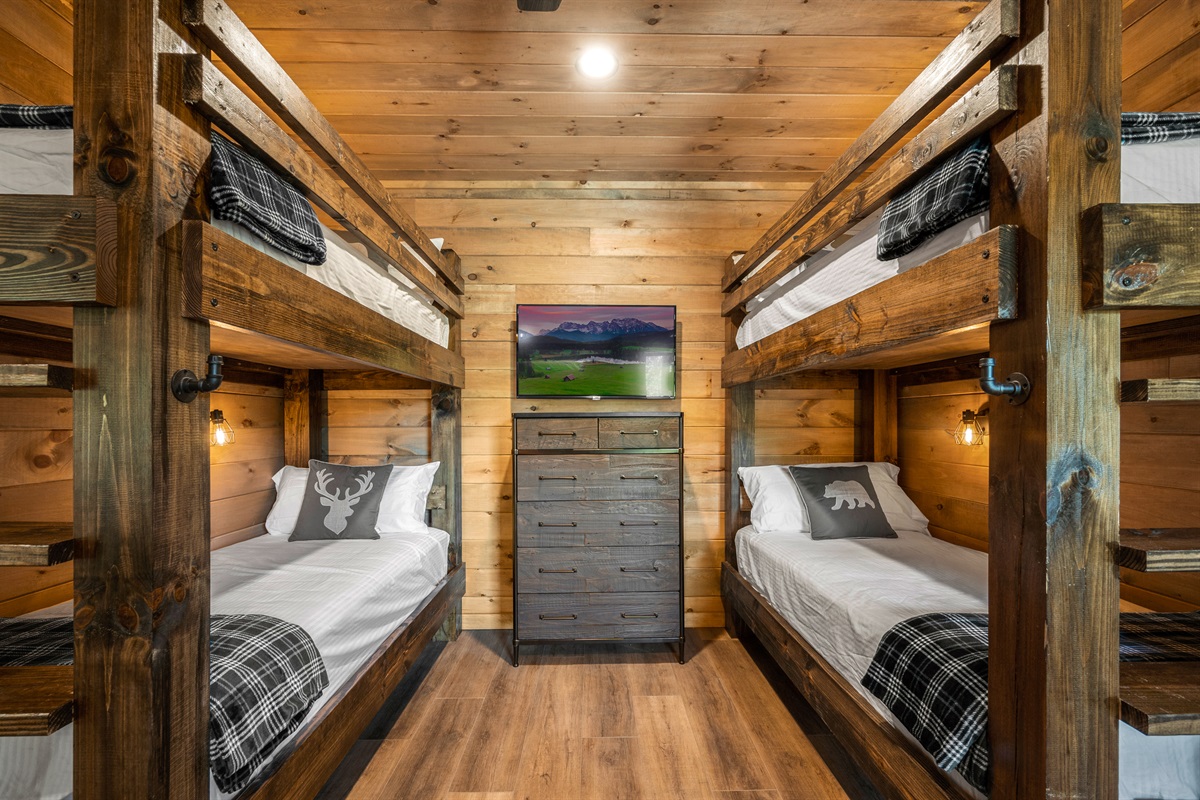 Our bunk room is perfect for kids but big enough to sleep adults as well. Each bed has it's own personal reading light. 