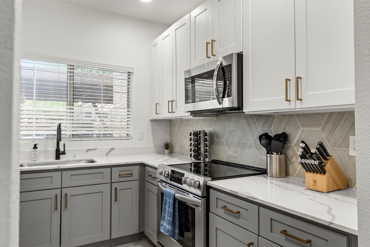 Cook your favorite meals with ease in this thoughtfully designed kitchen.