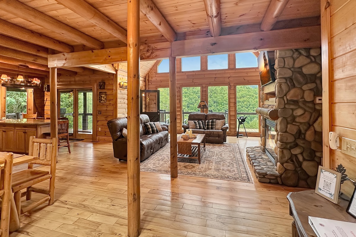 Living Room: Sun-drenched with stunning views, perfect for relaxation and gatherings!