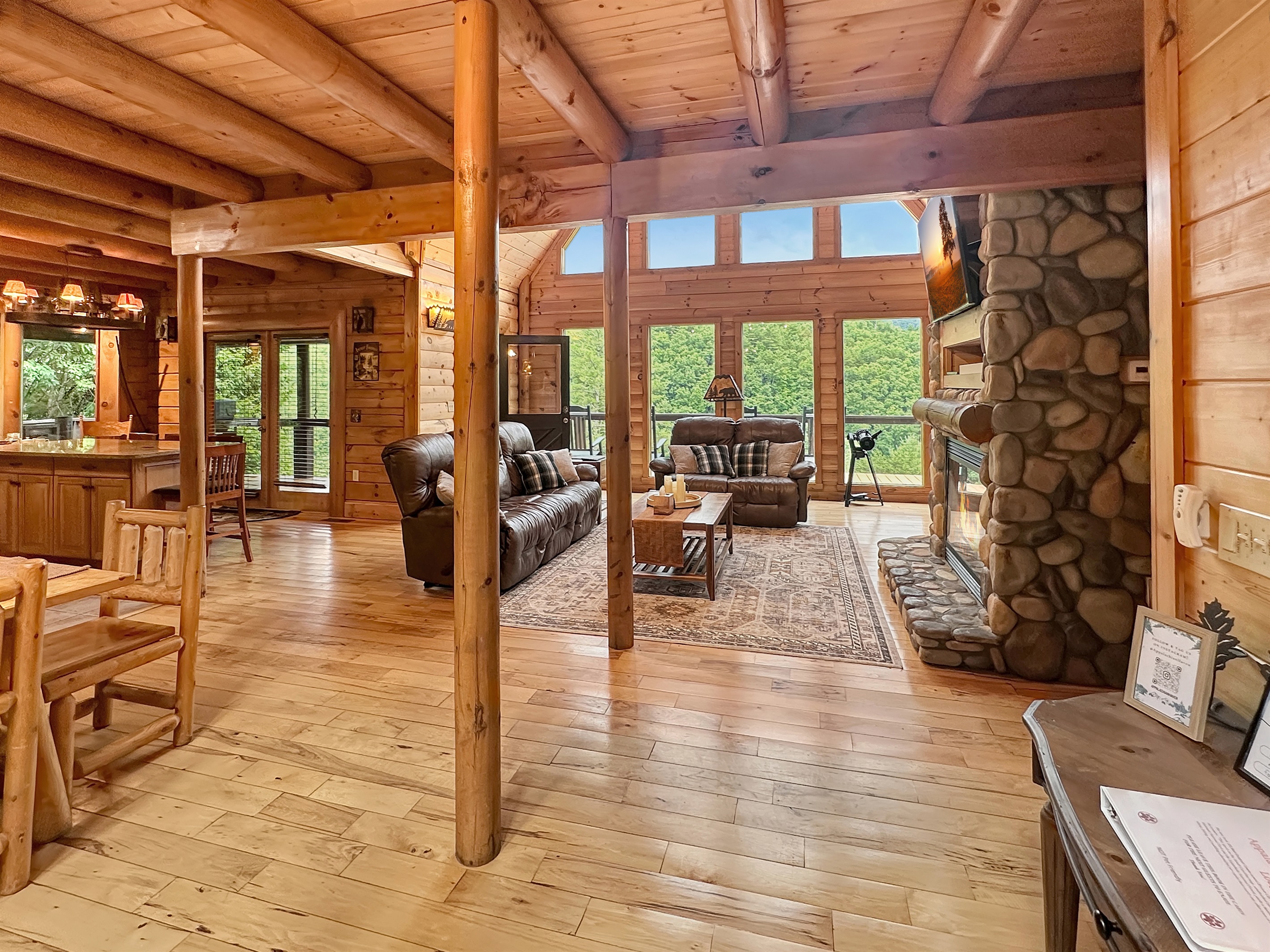 Living Room: Sun-drenched with stunning views, perfect for relaxation and gatherings!