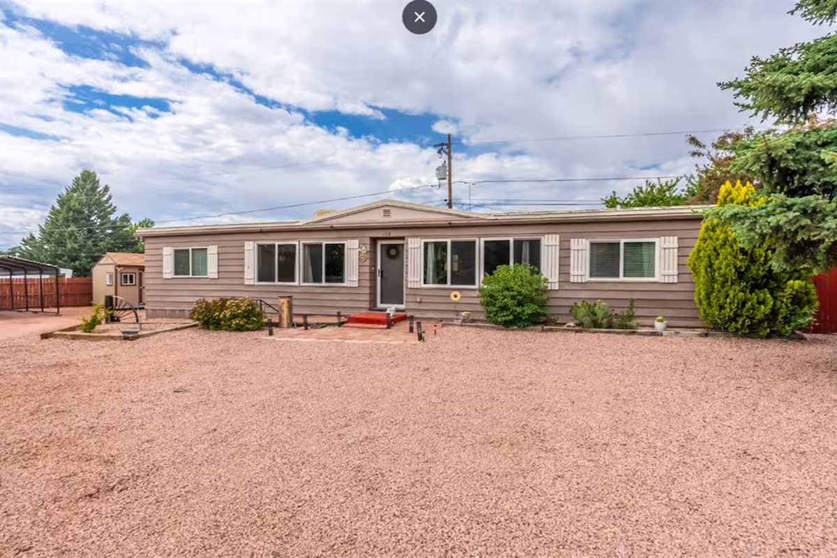 Welcome to your cozy retreat with spacious yard and easy parking.