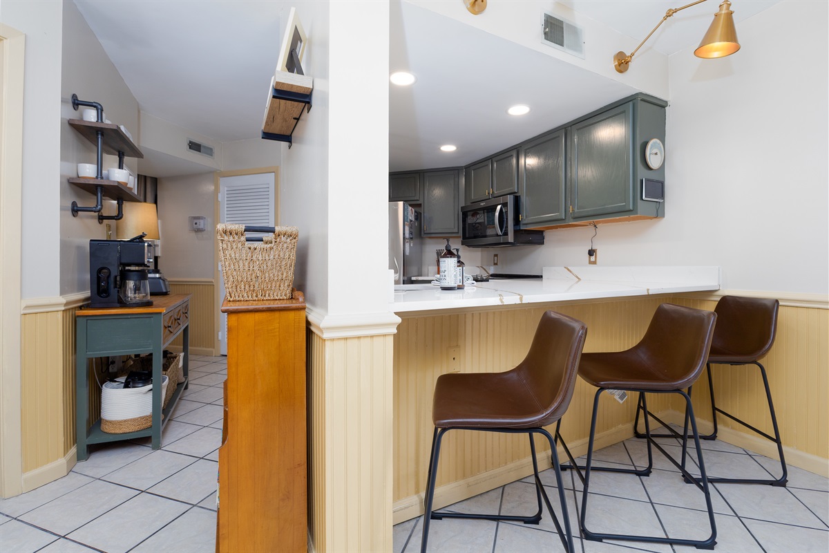 The open layout flows between the kitchen and dining area