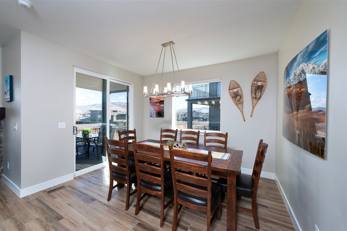 Sunlit dining area with scenic views in every direction
