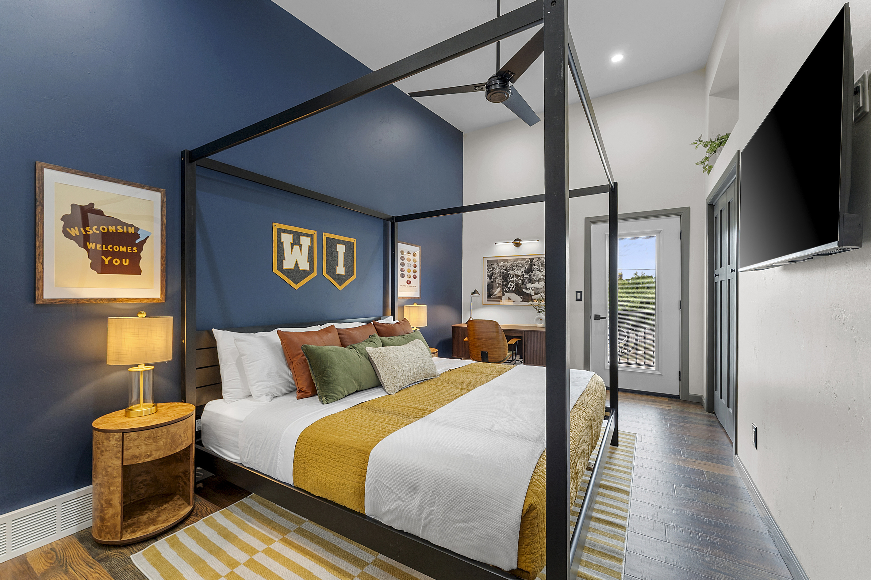 King bedroom with premium bedding, Smart TV and dedicated workspace.