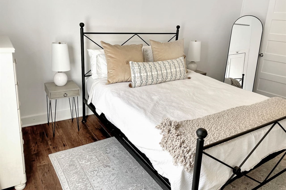 This queen sized bed will lull you to a restful sleep. Large drawers and closet are available in the room if you’d like to unpack a bit.