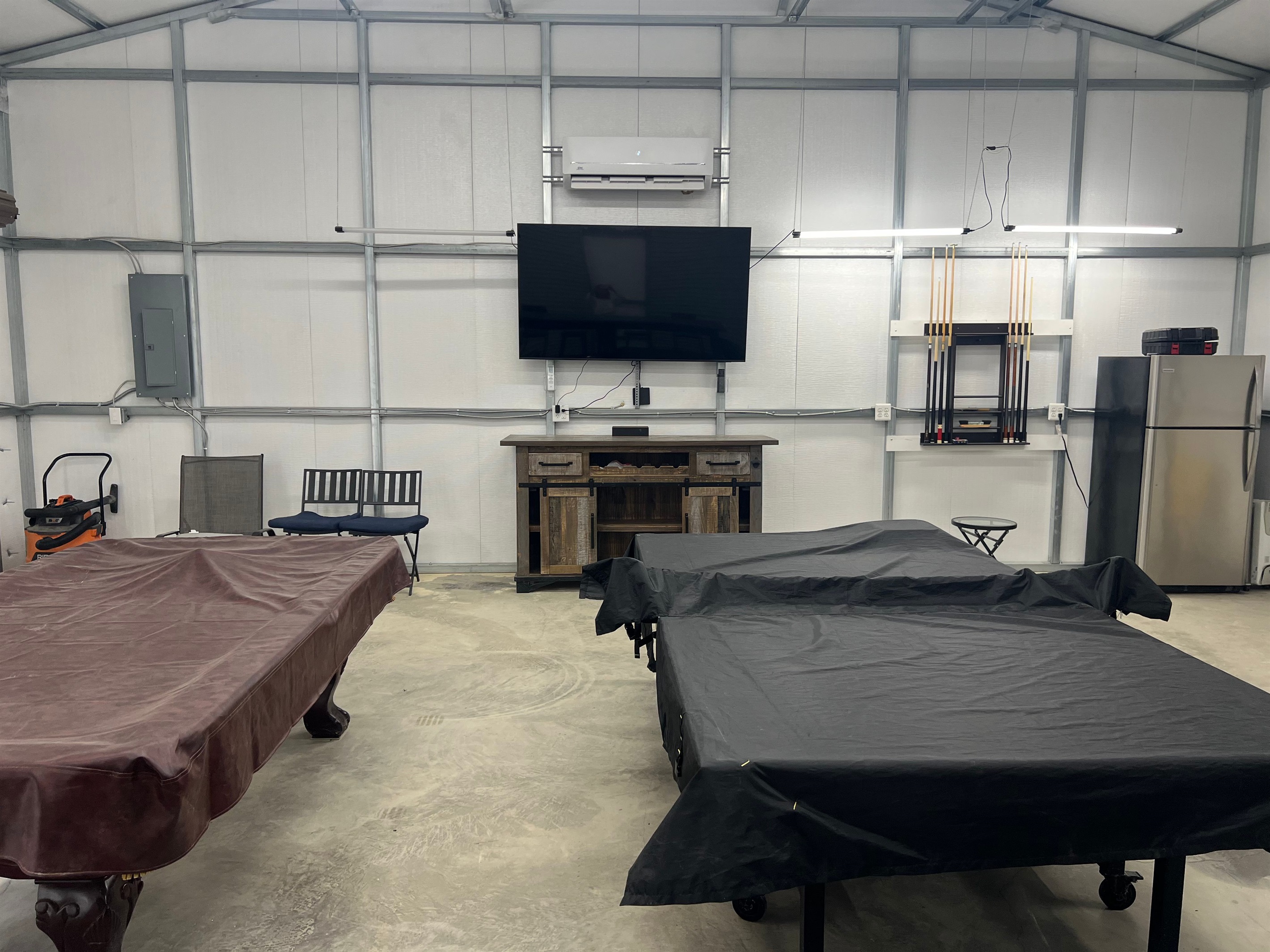  The game room has been upgraded with a newly installed smart TV. 