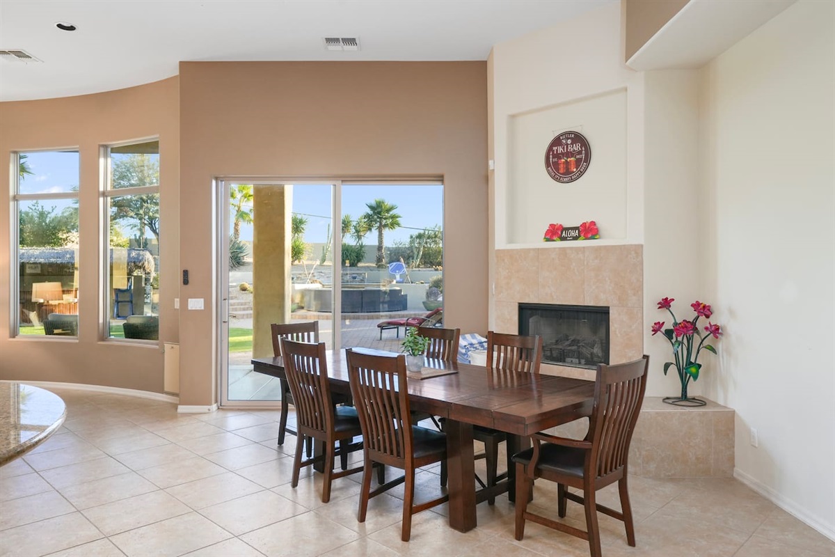 Spacious dining area with direct access to the backyard and abundant natural light