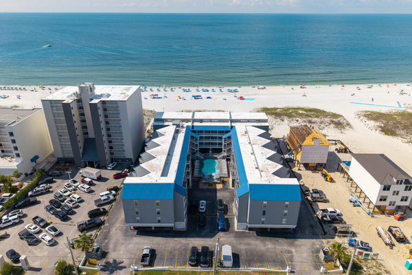 Beach right out back, parking right out front