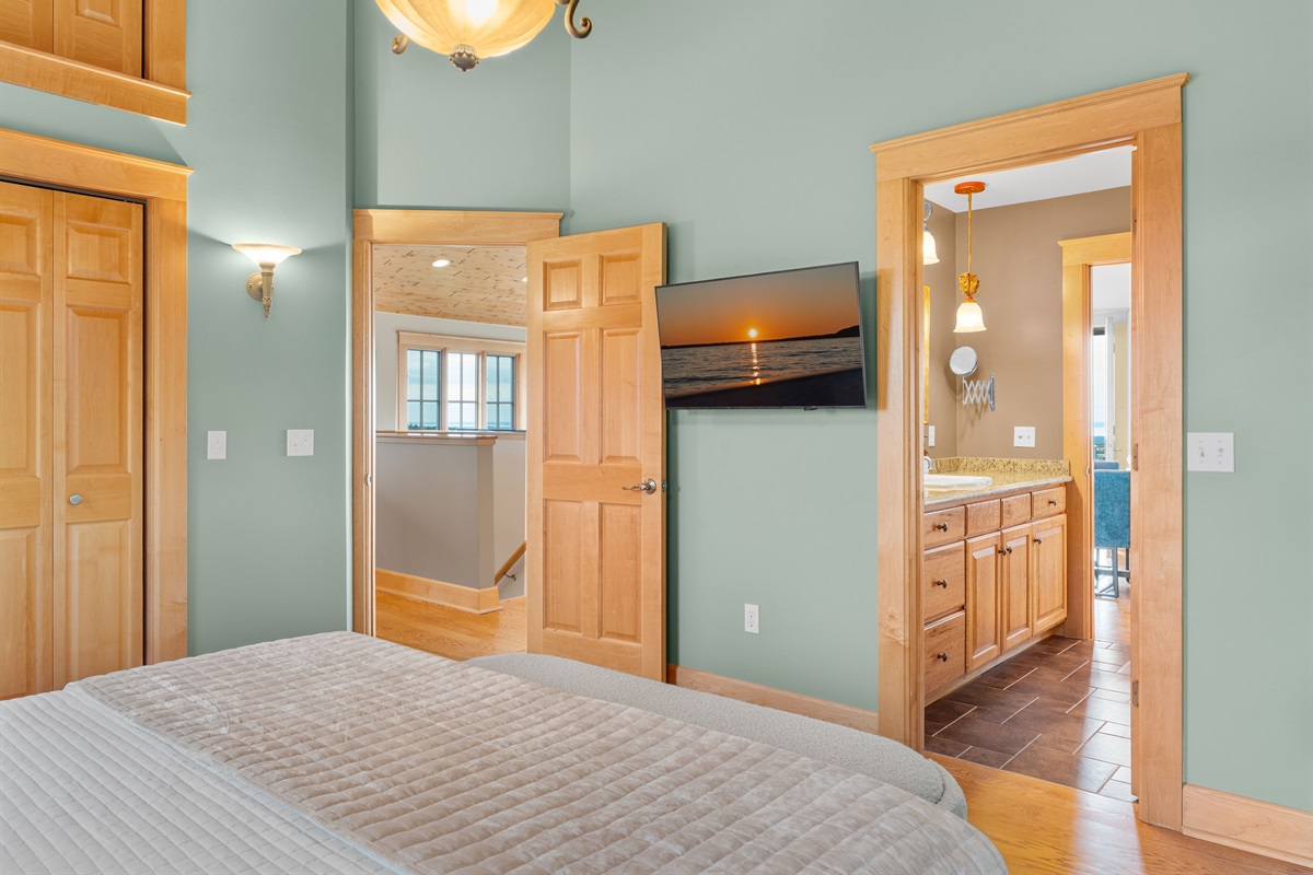 Enjoy your personal SmartTV and ensuite bathroom from the spacious primary bedroom on the upper level.