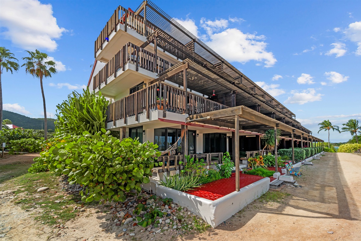 Charming condo building just moments from the sand and pool