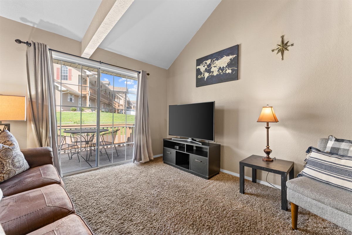 A bright living area with deck access makes it easy to lounge between adventures.