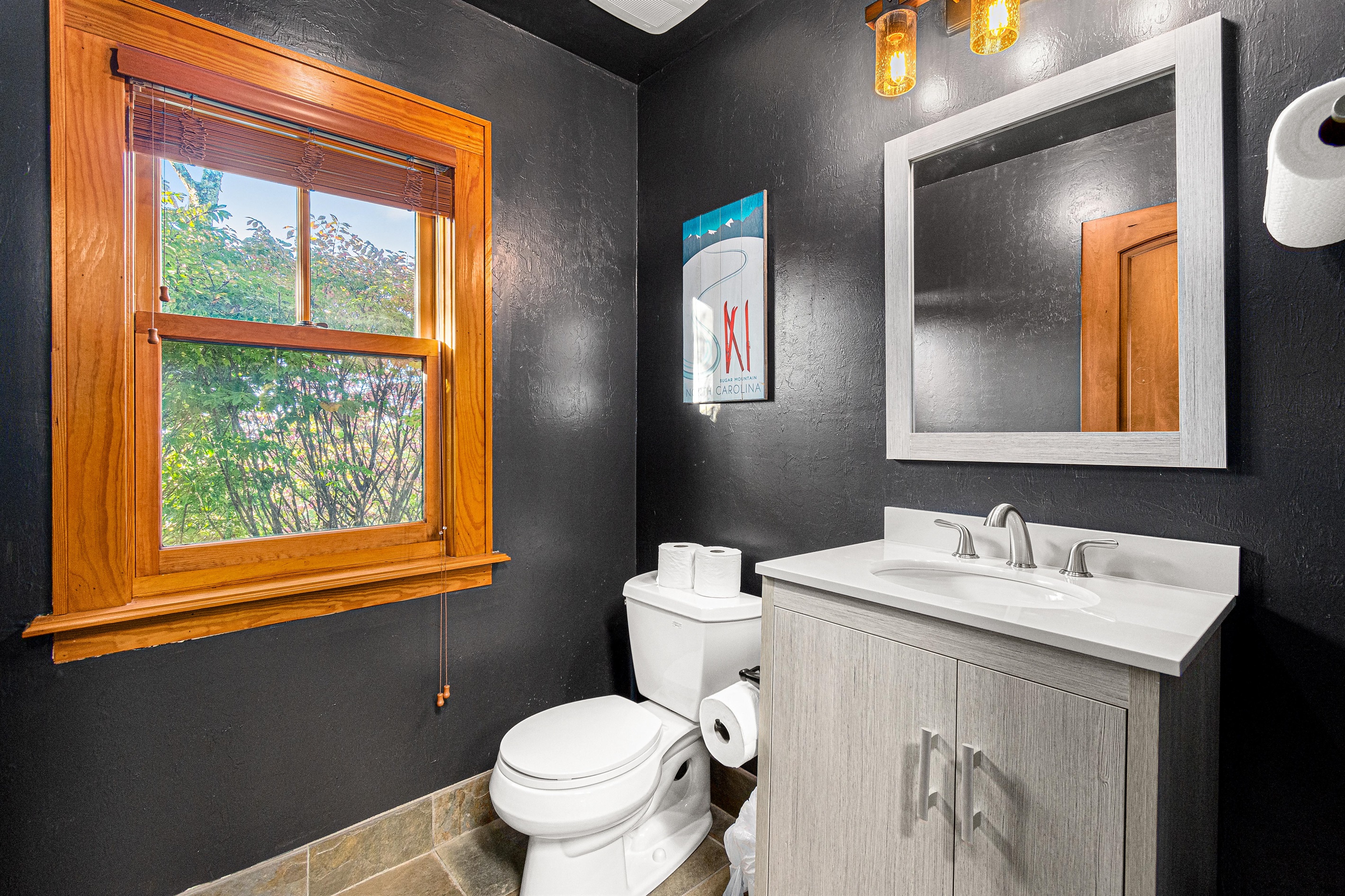 New 1/2 bathroom inside the game room.