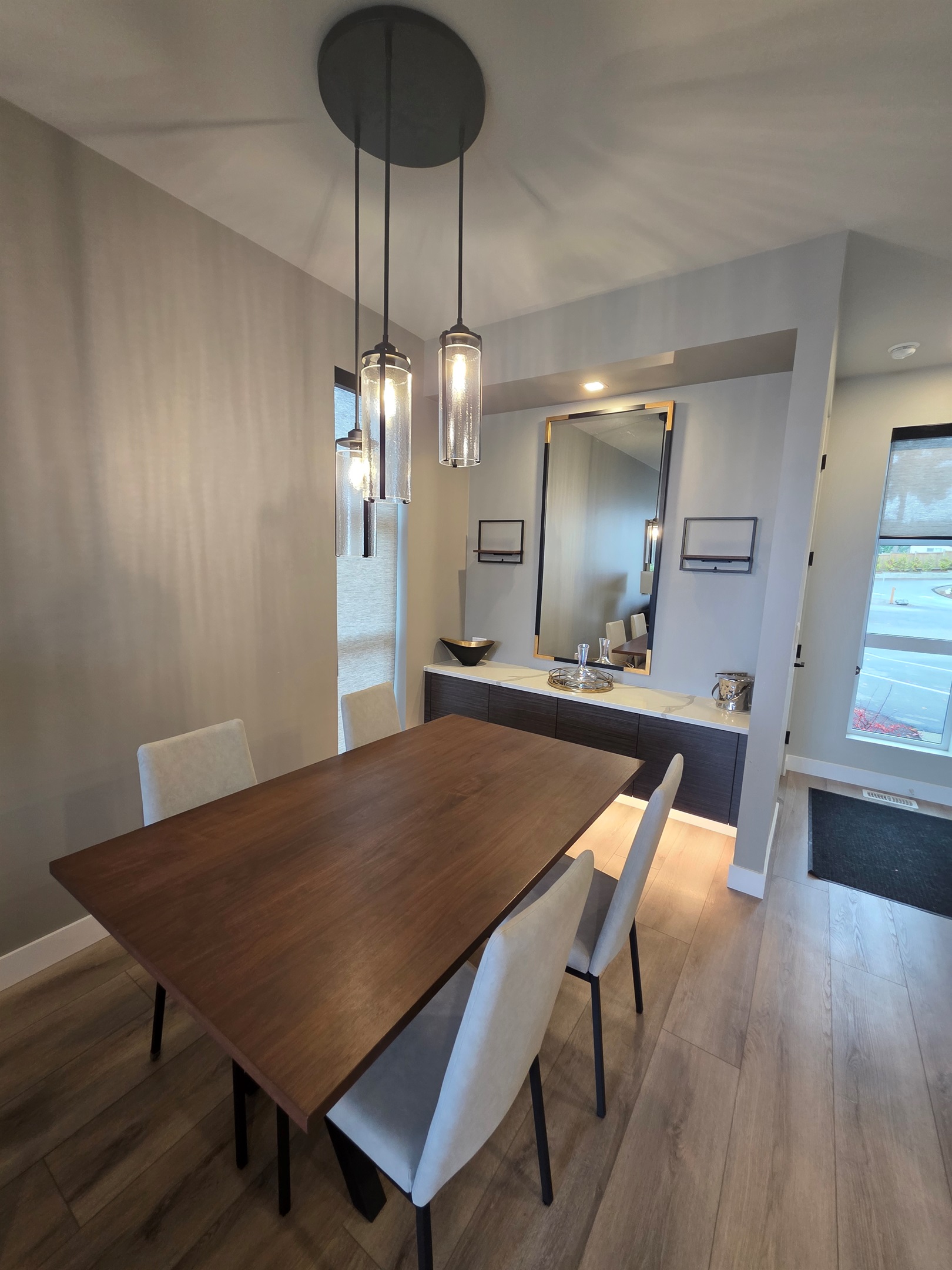 Dining area. Fully stocked with higher end glassware and coffee machine.