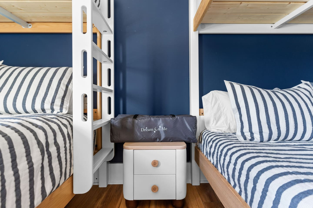 Family-friendly details make vacationing easier. Zen provides two Pack ’n Plays with sheets, helping parents lighten their load while ensuring little guests have a comfortable place to rest.