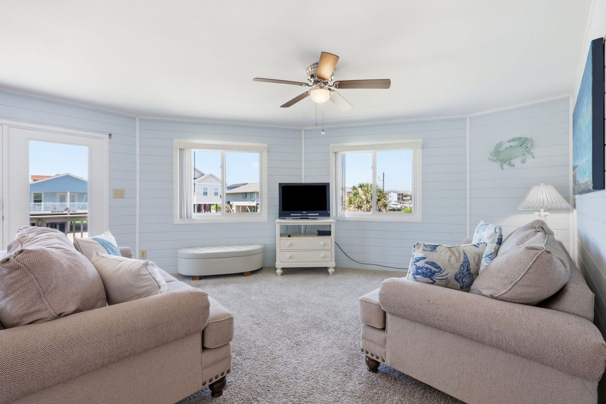 Bright, open living space designed for relaxing after the beach