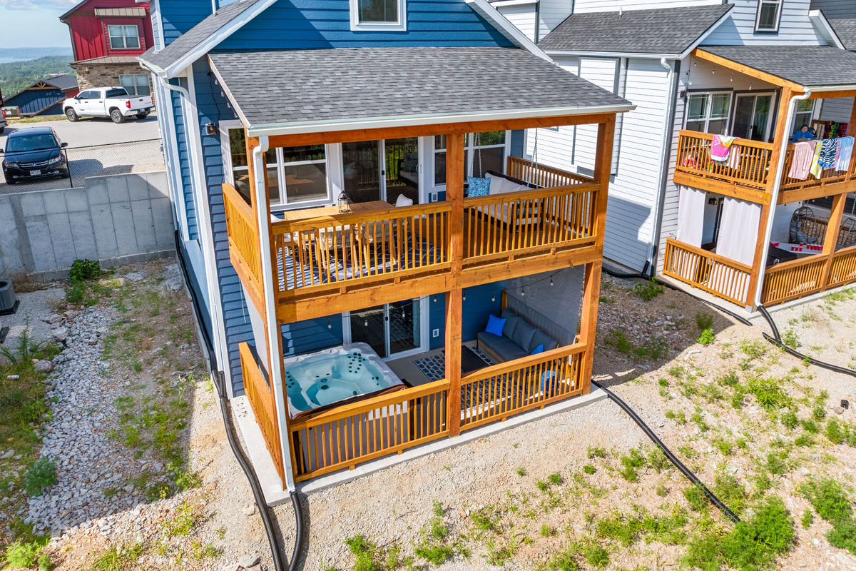 Relax after a long day in our 2 fenced in areas with private hot tub plus dining