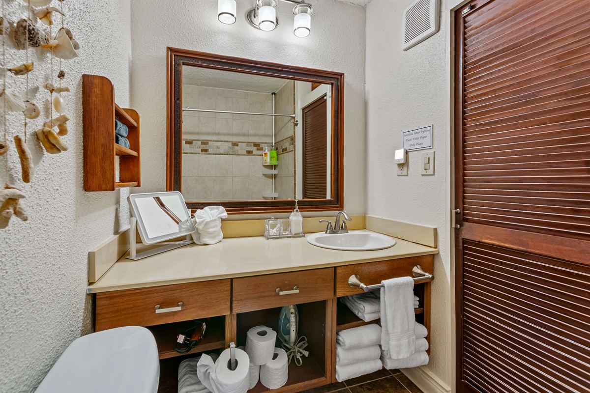 Stocked with towels, paper products, and basic soaps