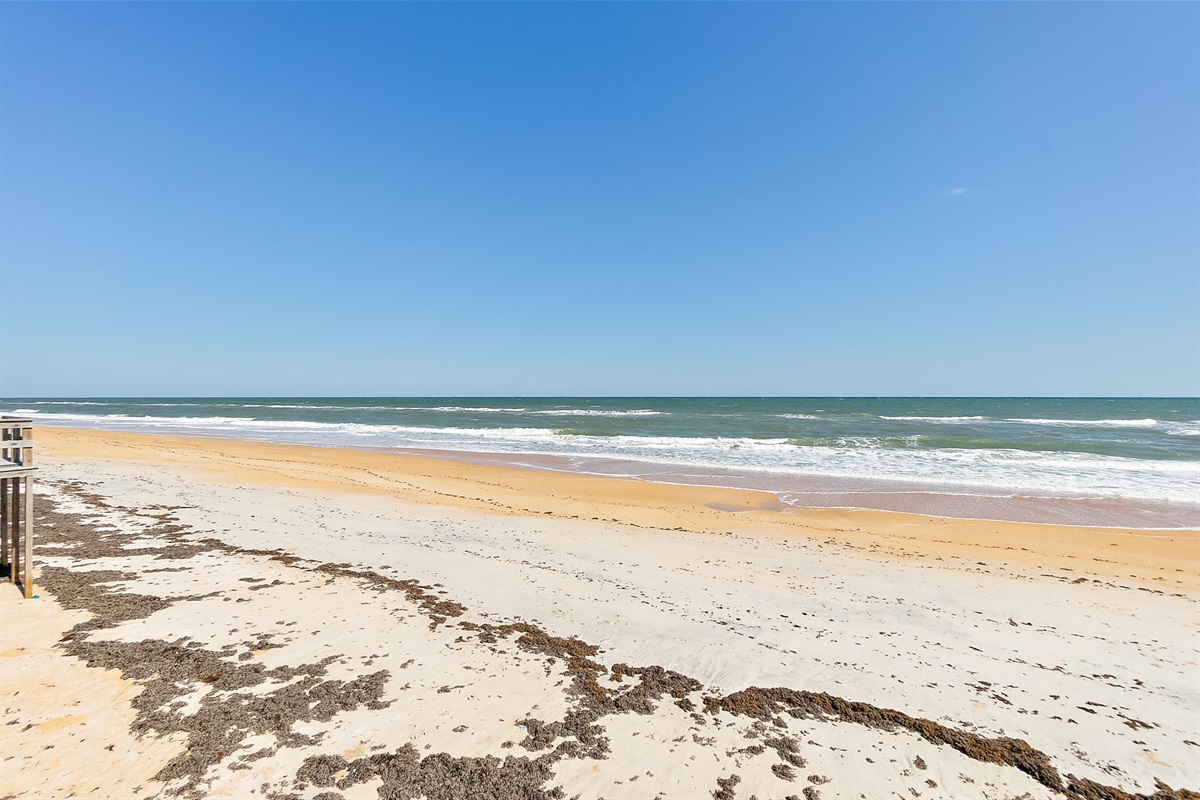 Wide sandy shoreline just steps from your door