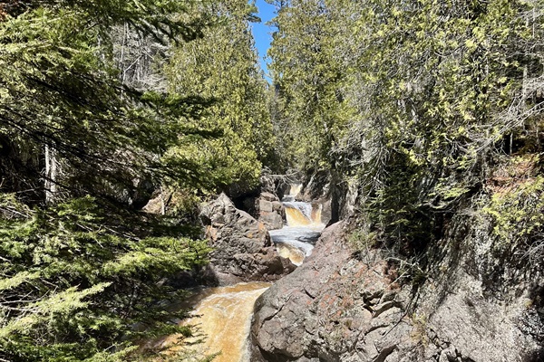 Cascade River State Park located 15 miles up 61. This uphill hike with plenty of stairs is a rewarding adventure you won’t want to miss. Park at Cascade River Parking.