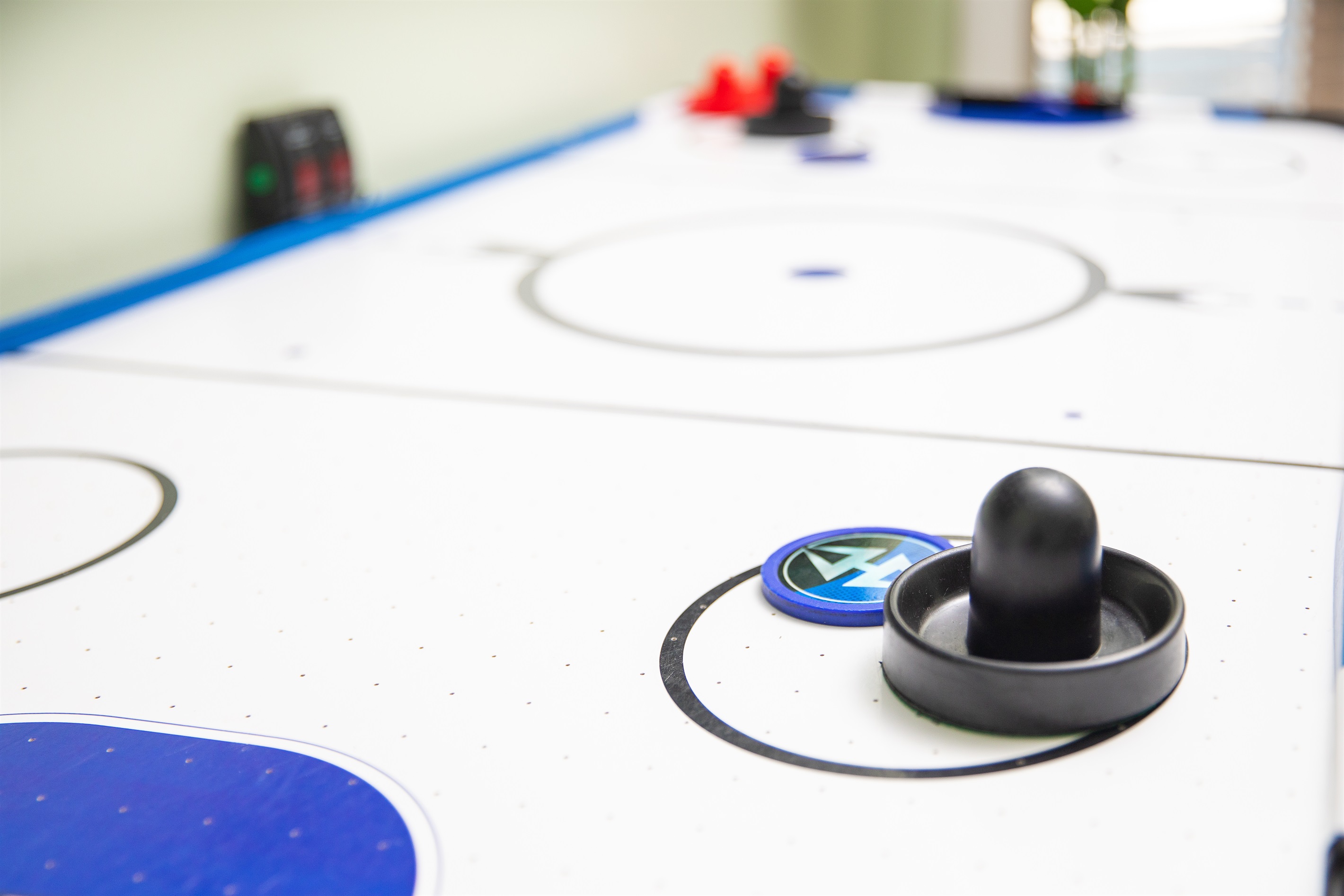 Gather for air hockey showdowns that turn downtime into high energy family bonding.