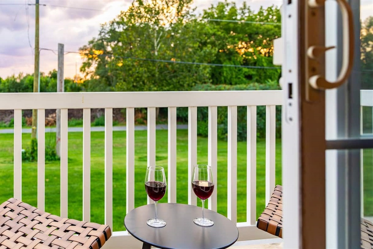 Relax on the deck with a glass of wine