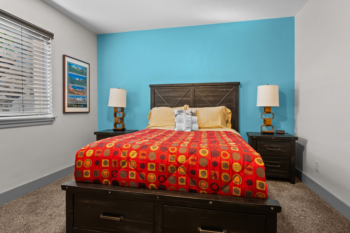 This queen bedroom is located on the lower level near the game room.