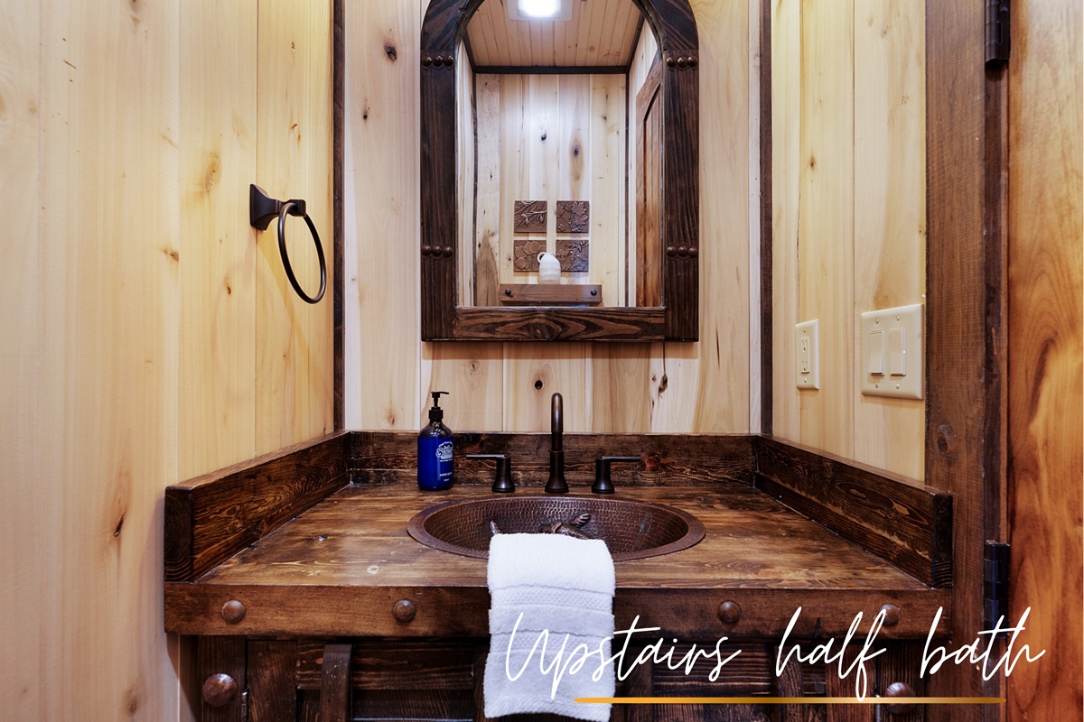 A convenient half bath, perfect for quick refreshes during your stay.