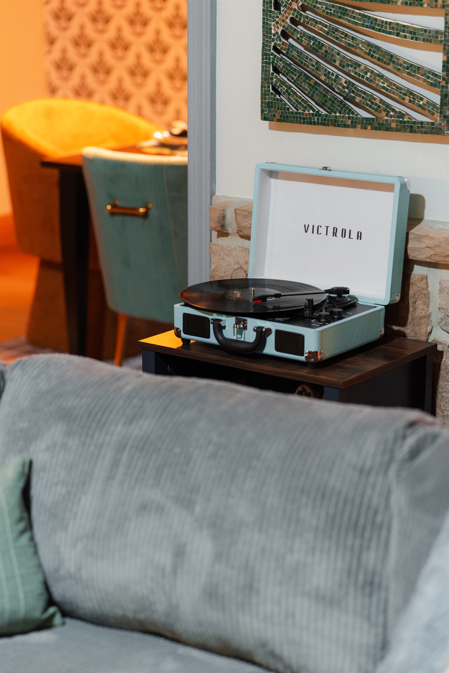 Relax with the timeless sounds of vinyl from the Victrola record player.