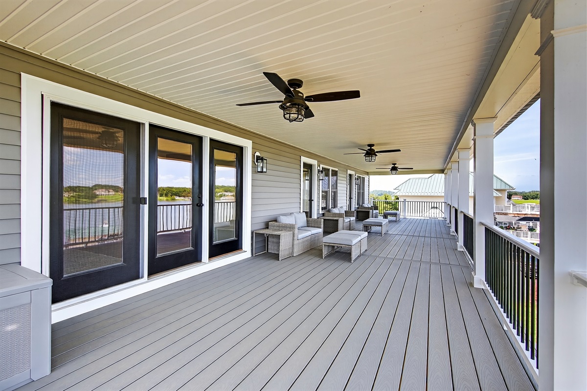 Breathtaking panoramic vistas from a spacious shaded deck, where lake breezes and relaxation come standard.