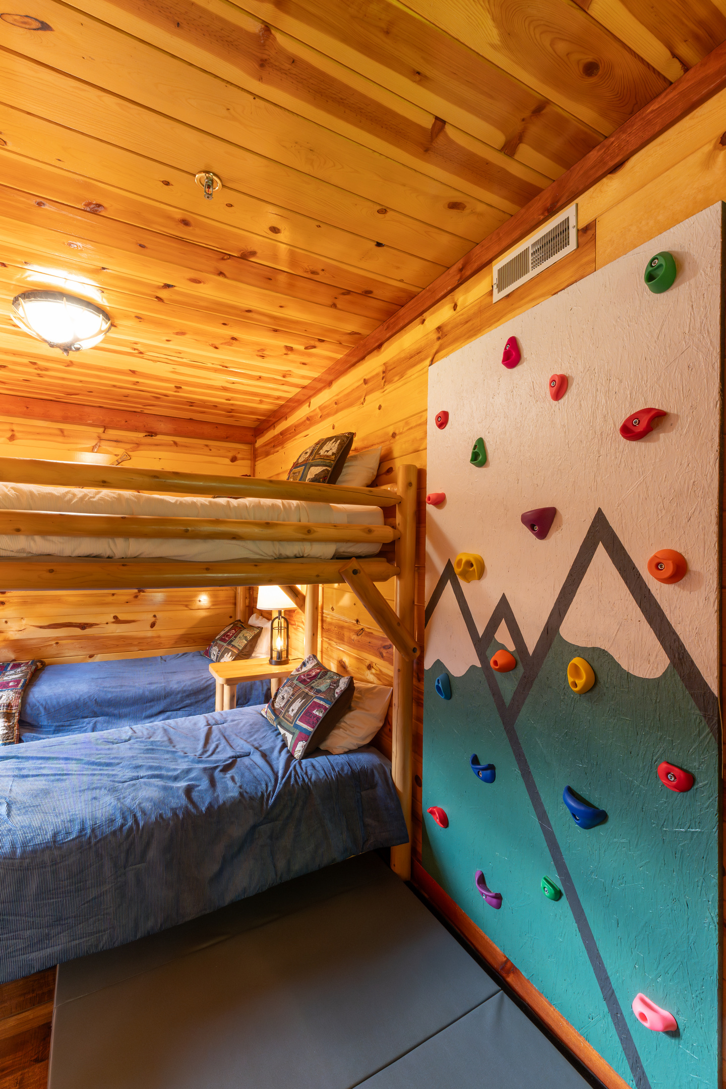 Bring the adventure on in the bunkroom as well with our rock wall!