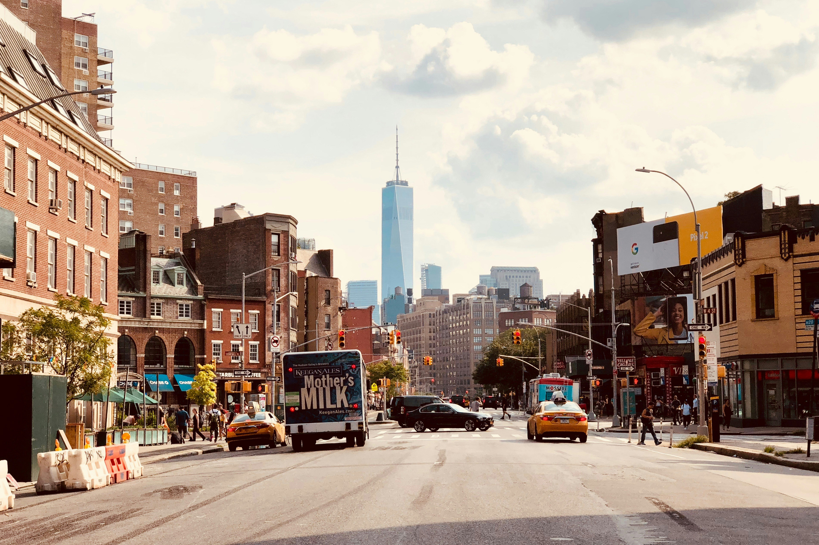 West Village street with NYC skyline — Downtown Manhattan vacation rental
