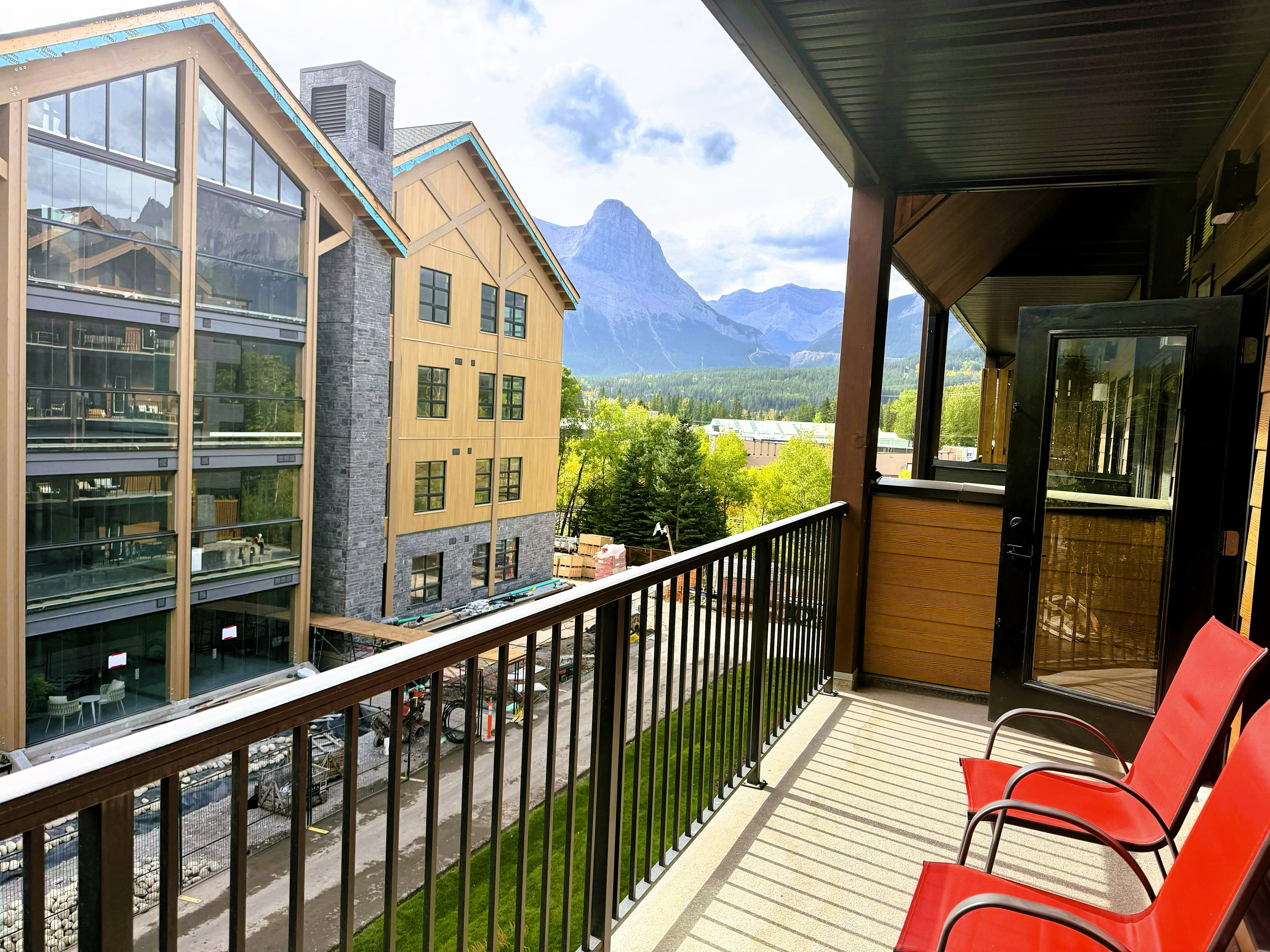 Spacious private balcony, with partial mountain view, Ha Ling Peak visible on your right.