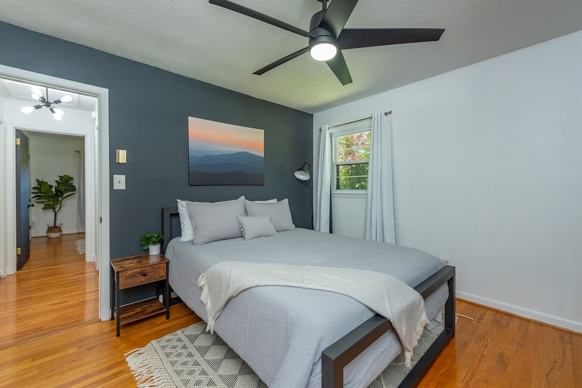 Bedroom 1- rest and relax on back side of house. Awesome mattress, again light works w switch n remote, 2nd TV w remote. Black out ivory curtain on both windows.  2 large Clean bath towels & washcloths are in a clean basket  in each bedroom.