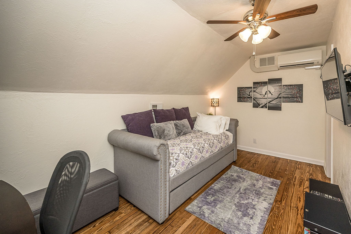 Upstairs bedroom has a twin daybed with a twin trundle that pulls out.
