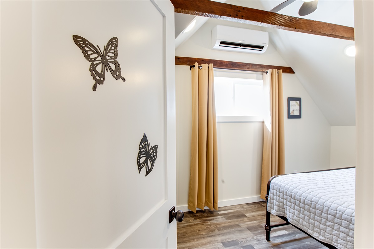 Bedroom 3 (butterfly room): Queen bed plus walk in closet with crib and desk