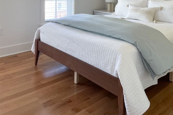 Rest easy in this bright, welcoming main bedroom upstairs.