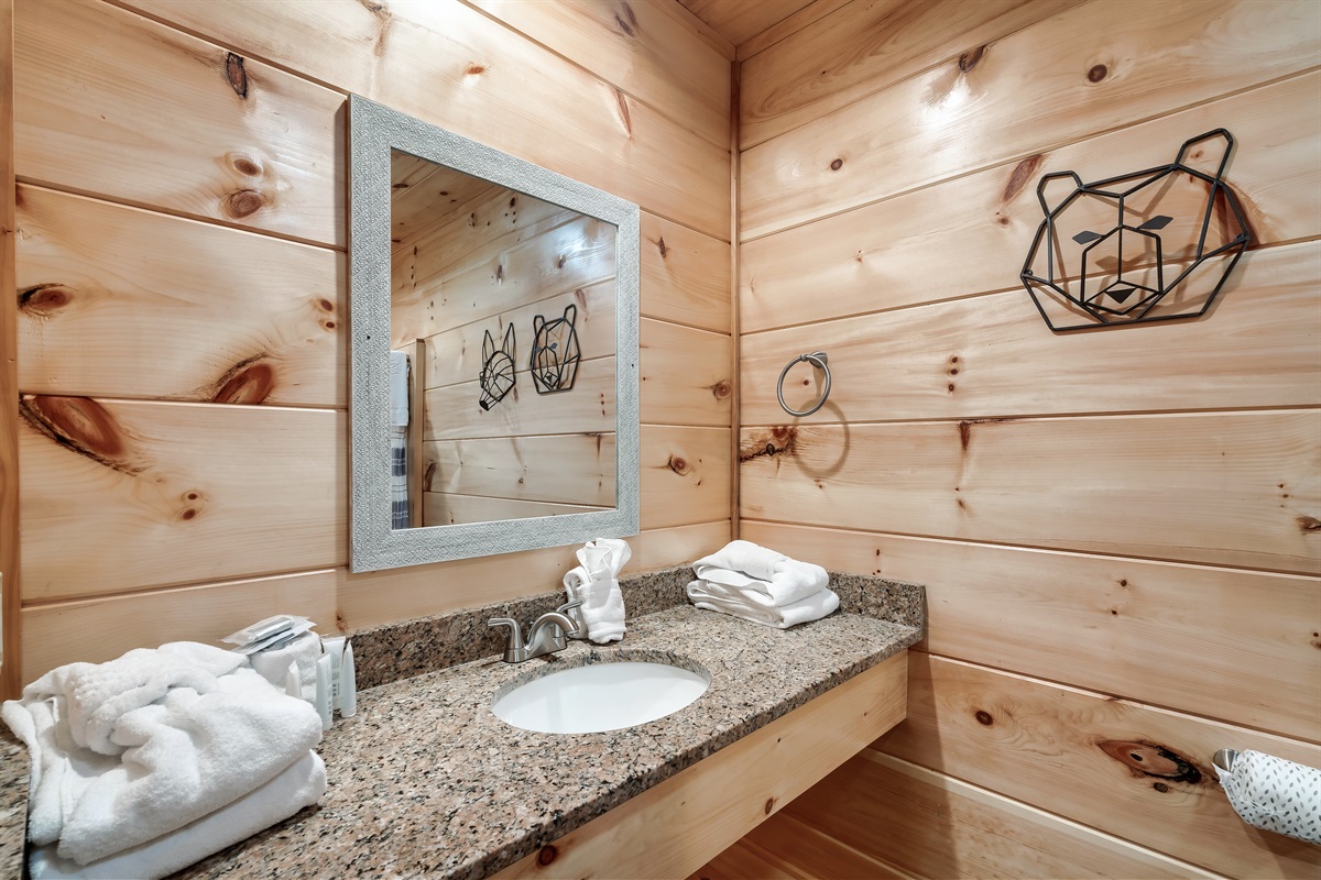 Bathroom with starter supplies and towels. 