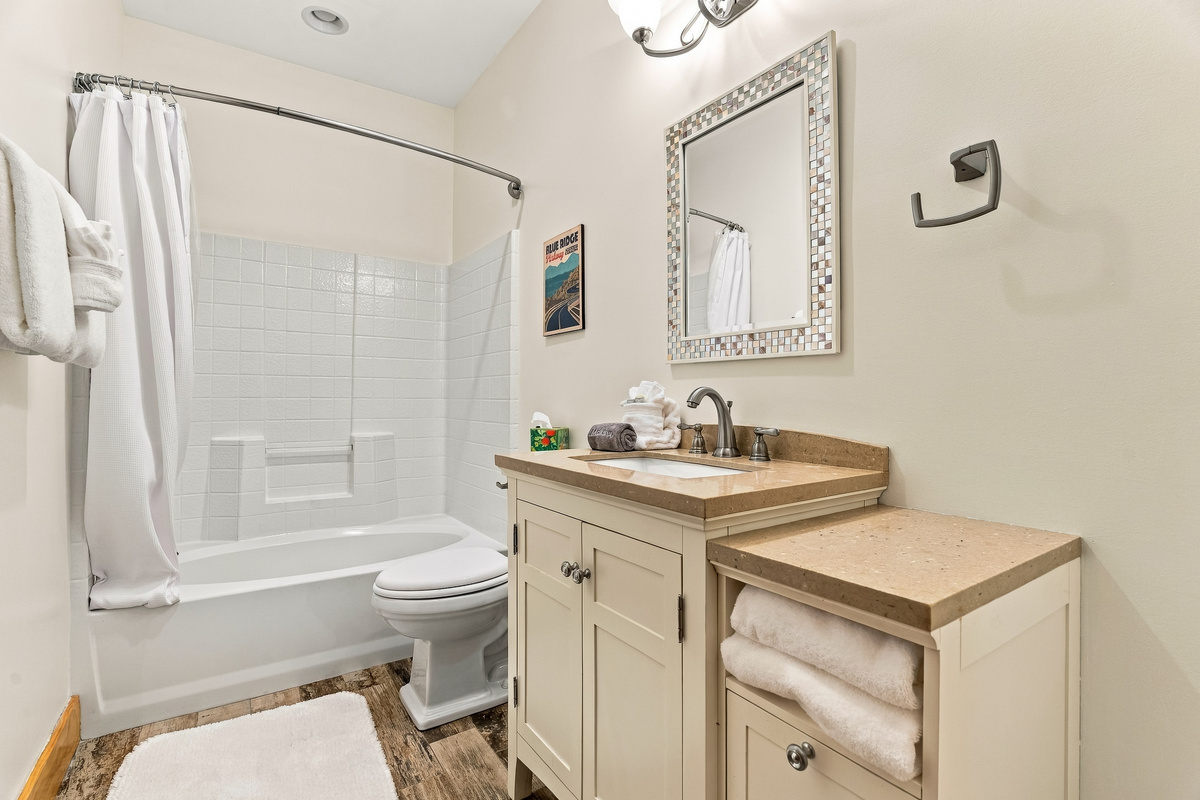 Bathroom 3 with shower and bathtub combo
