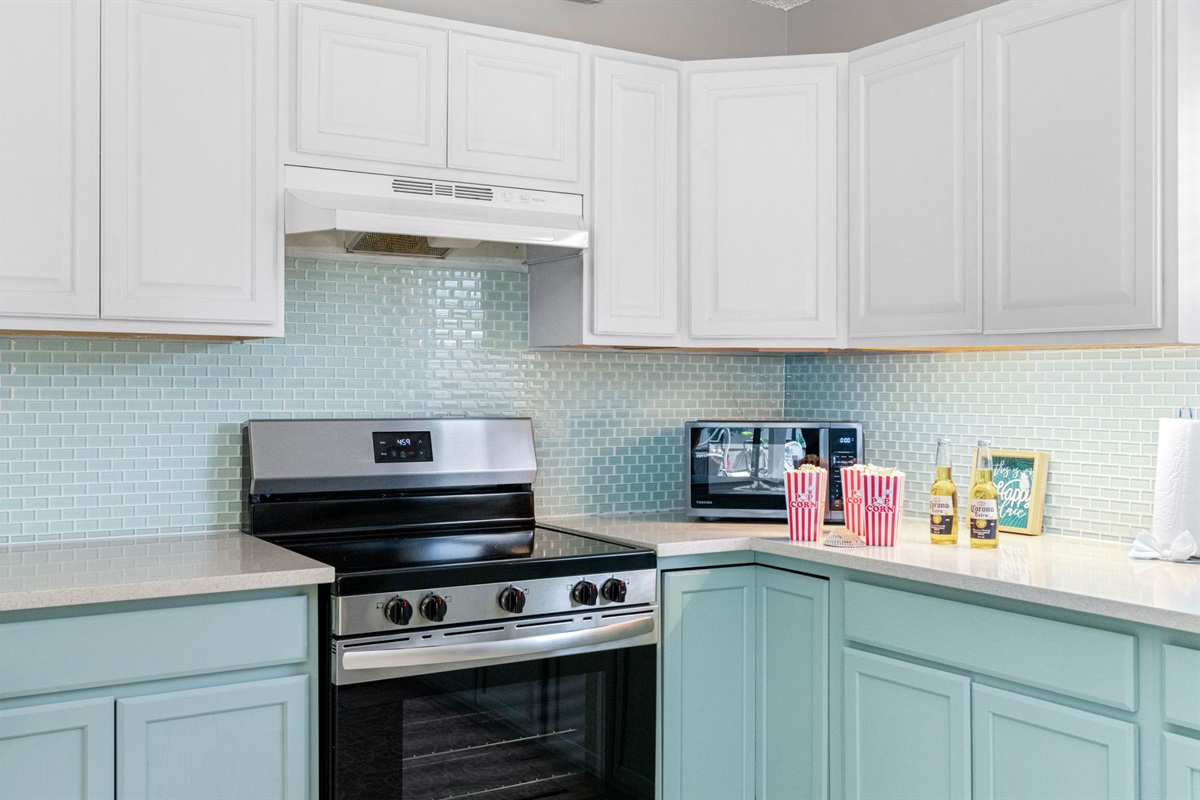 This spacious, fully-equipped kitchen combines stylish design with everyday functionality—perfect for everything from a sunrise coffee routine to a full family dinner after a day exploring.