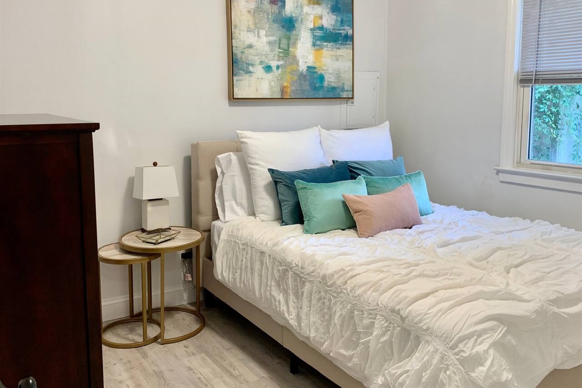 Queen bed with a super comfortable mattress, full tall dresser and closet