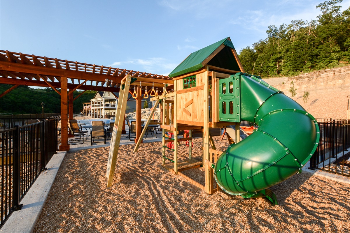 Community playground located beside the outdoor pool