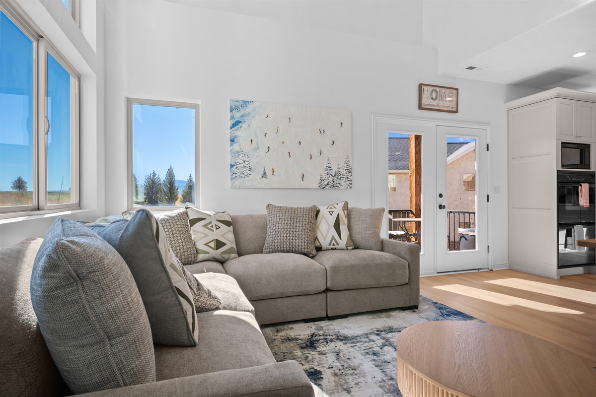 The perfect spot to unwind, featuring mountain-themed art and natural light.