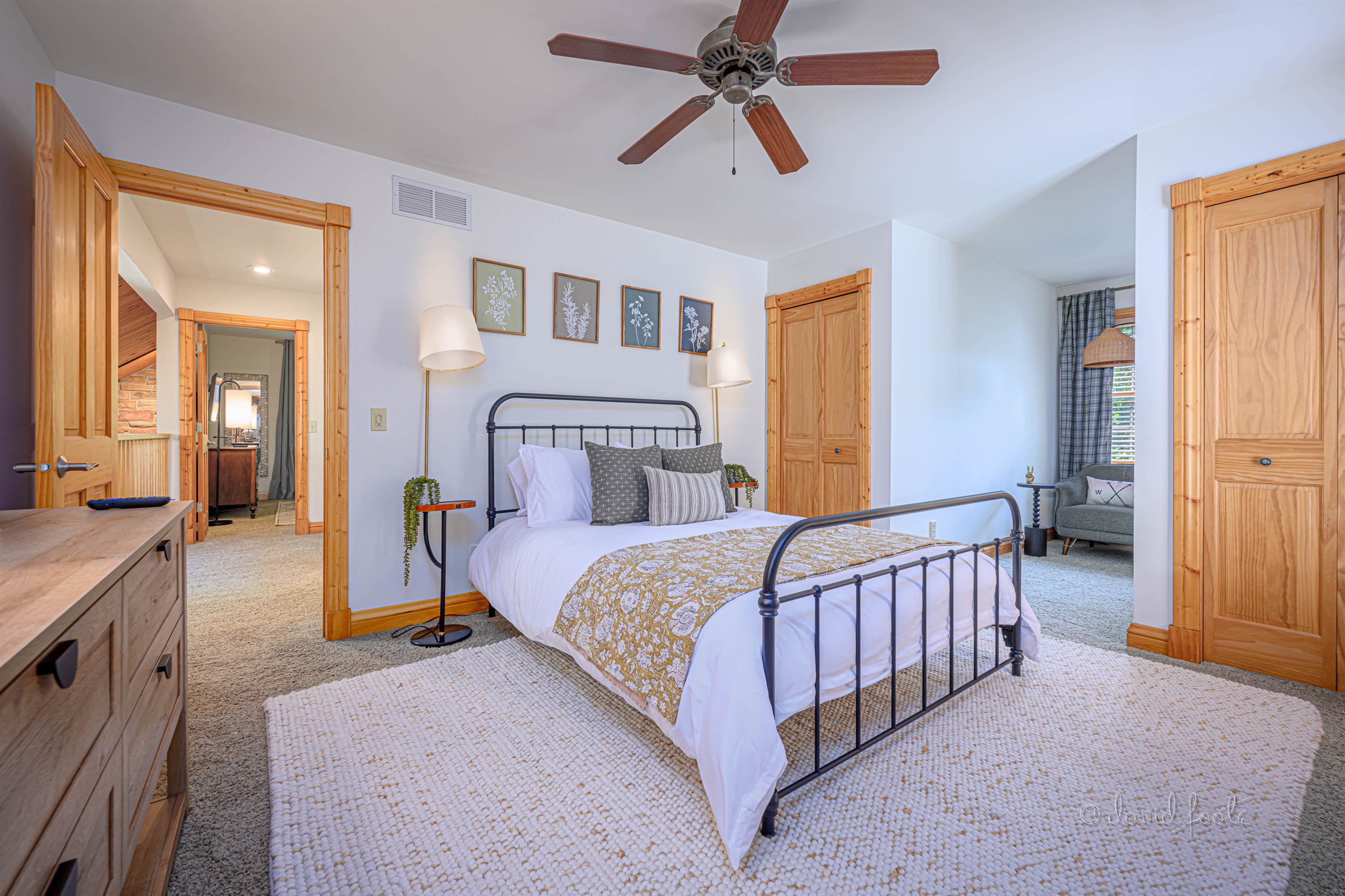 Upstairs queen bedroom with Roku TV and private reading nook