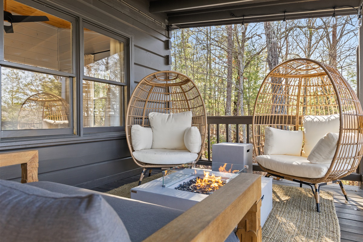 Outdoor amenities like this charming seating area create the perfect setting for relaxation and connection.