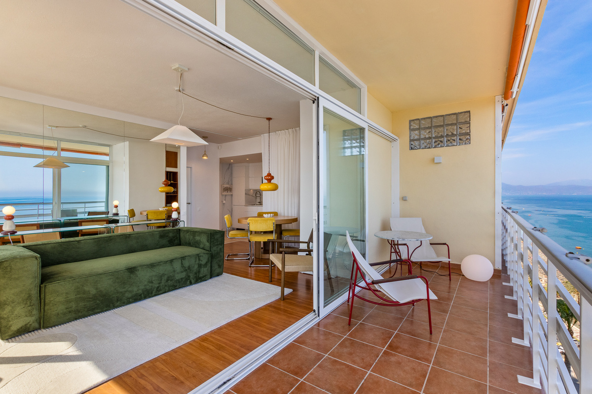 One of the suite's balconies, connecting indoor living with sea views.